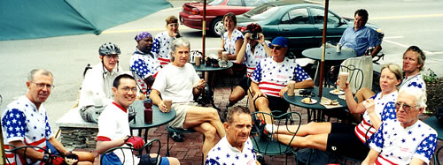 Group of ABB riders at cafe.
