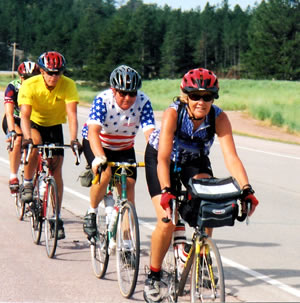 Four cyclists in paceline.